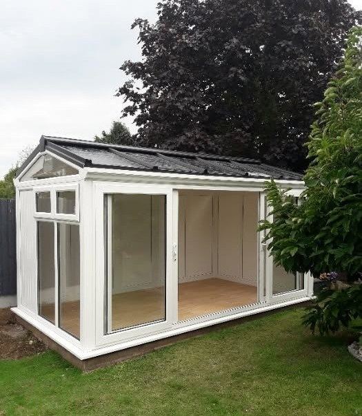 White compact garden room